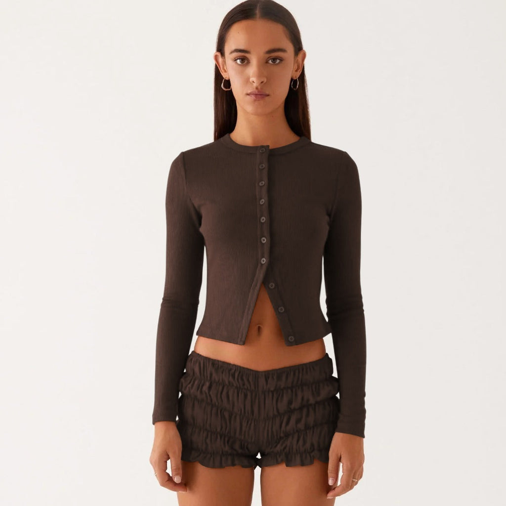 Einfarbige schmal geschnittene lange Strickjacke