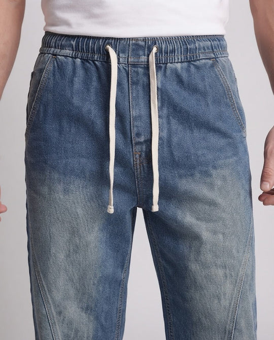 Herren Weite Denim-Palazzohose mit geschwungenen Seitennähten und Used-Wash Shop Nory