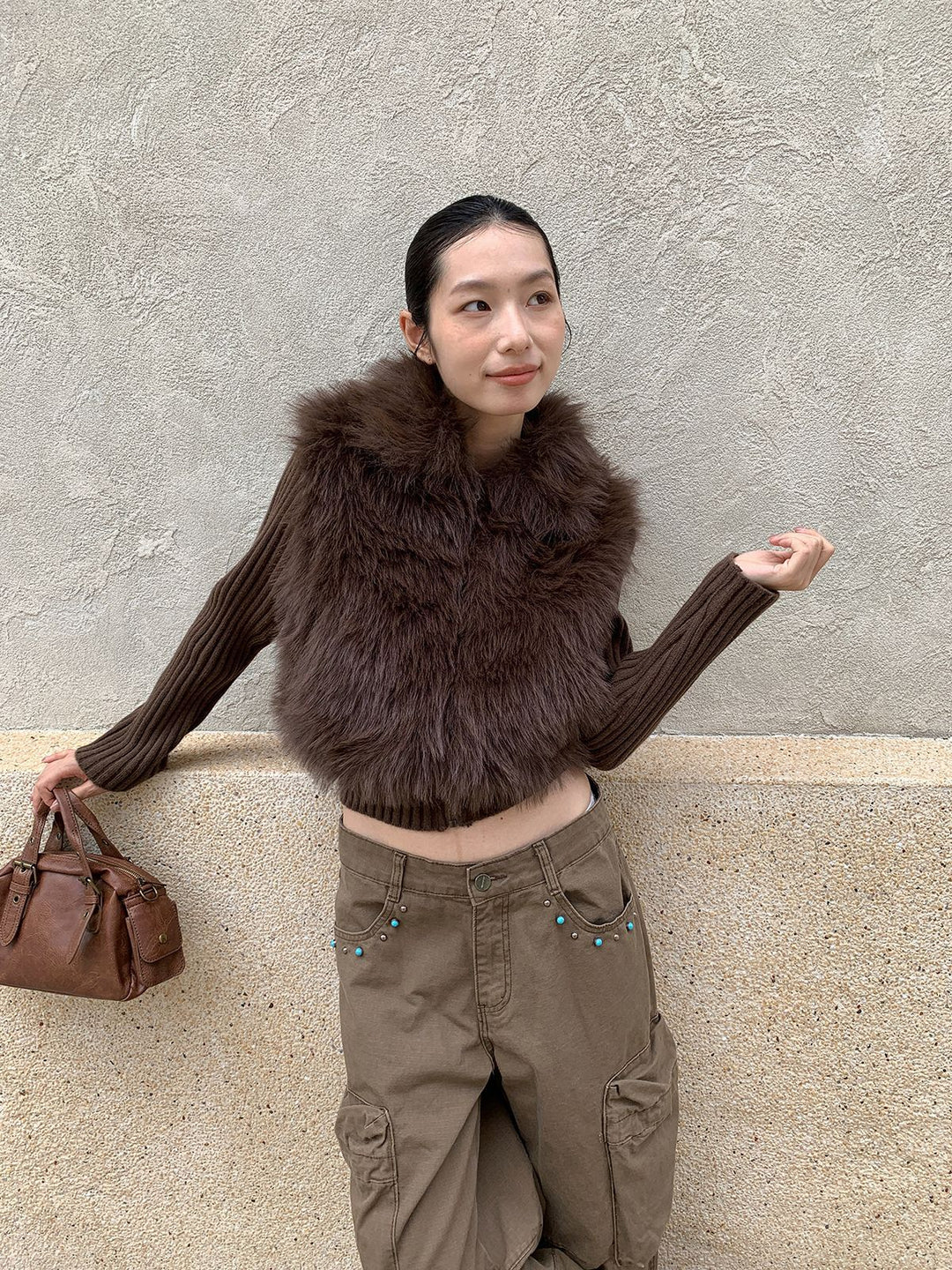 Strickjacke mit Kunstfell-Besatz und Reverskragen