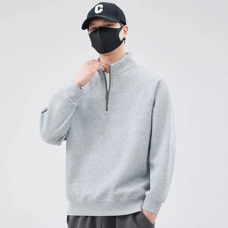 Lockerer Pullover mit Stehkragen und Reißverschluss