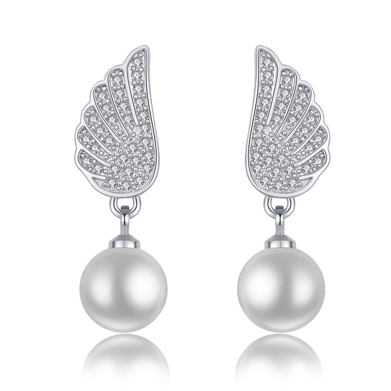 Damen Ohrringe mit elegantem Flügel-Design und Perlenanhänger Shop Nory