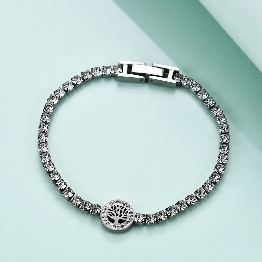 Damen Armband aus Edelstahl mit funkelnden Zirkonia und Baum-des-Lebens-Motiv Shop Nory