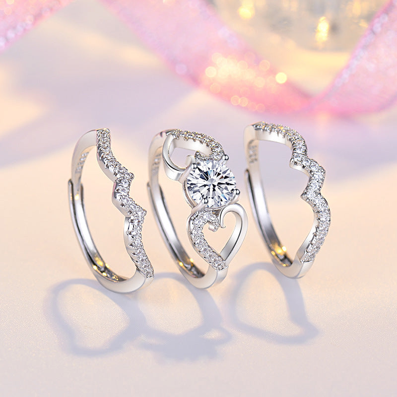 Damenring mit kunstvollem Zirkonia-Besatz und elegantem Wellenmuster Shop Nory