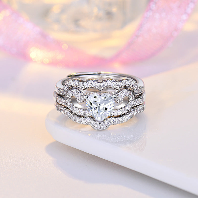 Damen Verlobungsring mit kunstvollem Herzdesign und funkelnden Zirkonia Shop Nory