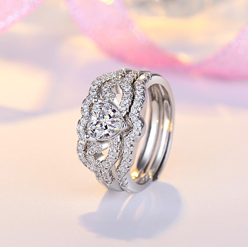 Damen Verlobungsring mit kunstvollem Herzdesign und funkelnden Zirkonia Shop Nory