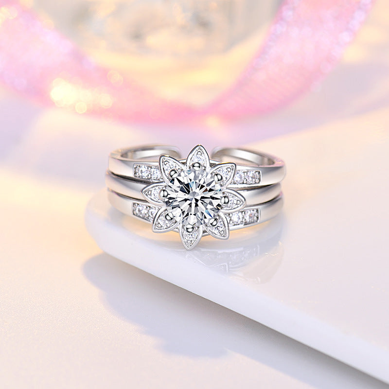 Damen Blütenring mit funkelndem Zirkonia-Besatz und eleganter Konstruktion Shop Nory