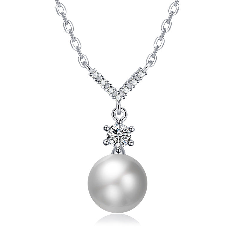 Damen Halskette mit funkelndem Zirkonia-Anhänger und eleganter Perle Shop Nory