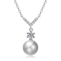Damen Halskette mit funkelndem Zirkonia-Anhänger und eleganter Perle Shop Nory