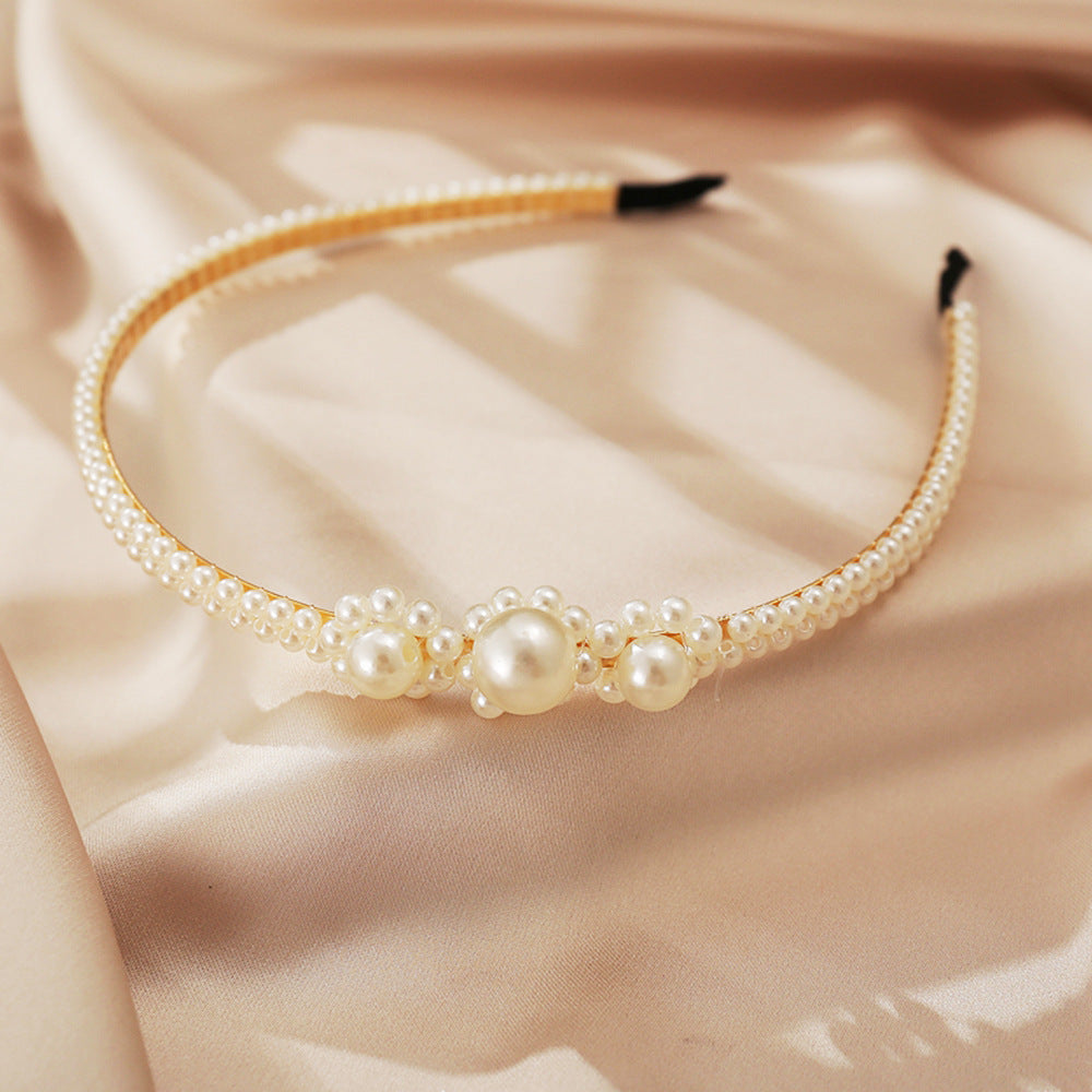 Damen Haarband mit eleganten Perlenverzierungen Shop Nory