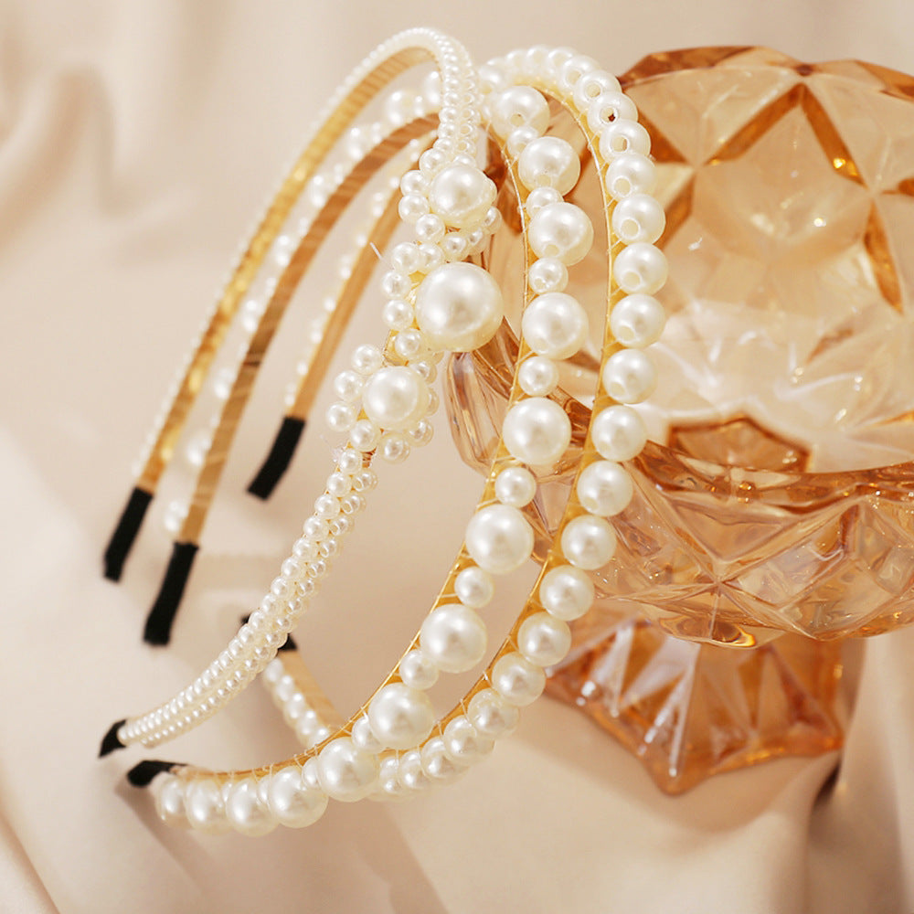 Damen Haarband mit eleganten Perlenverzierungen Shop Nory