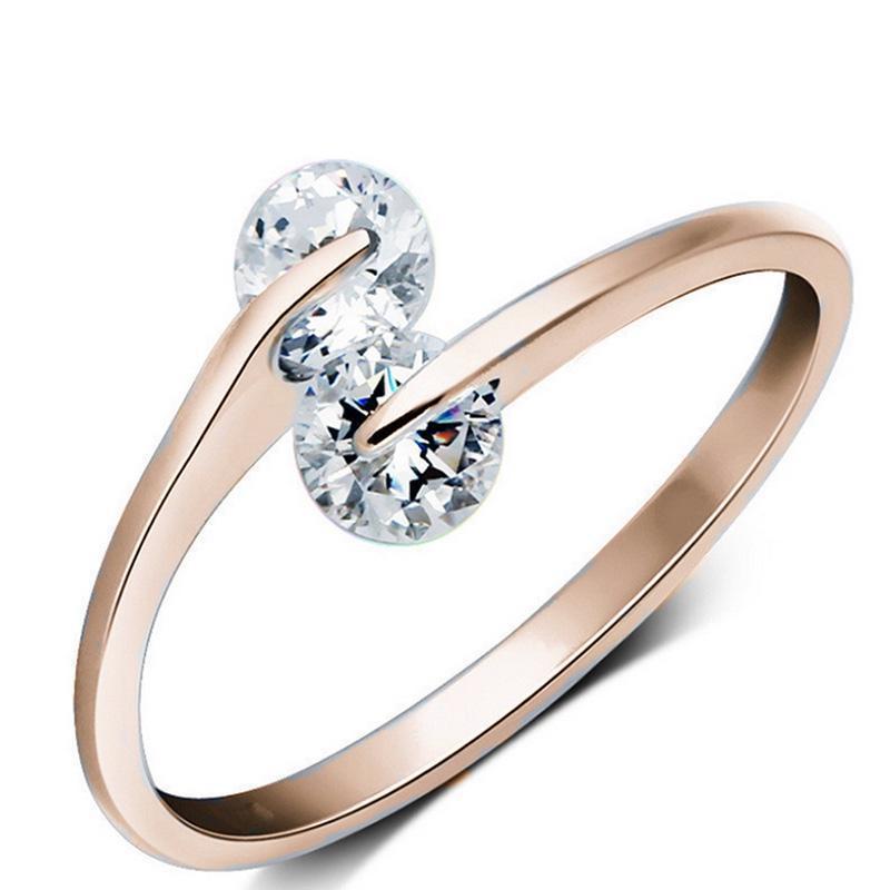 Damenring mit funkelndem Zirkonia-Besatz und elegantem, geschwungenem Design Shop Nory