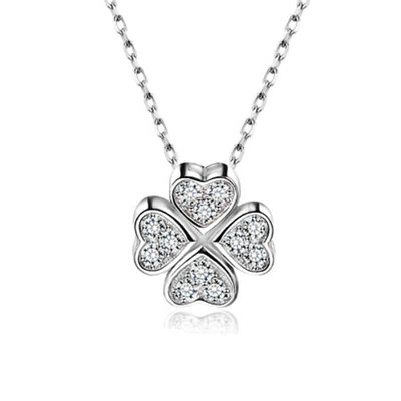 Damen Halskette mit herzförmigem Glücksanhänger und funkelnden Zirkonia Shop Nory