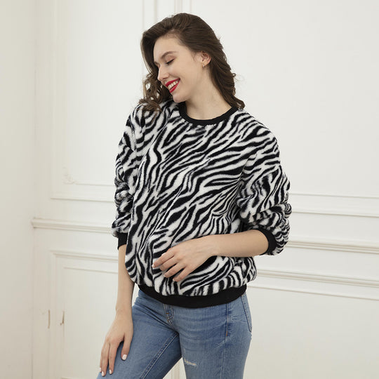 Damen Flauschiger weit geschnittener Pullover mit ZShop Noryra‑Alloverprint und Rippbündchen Shop Nory