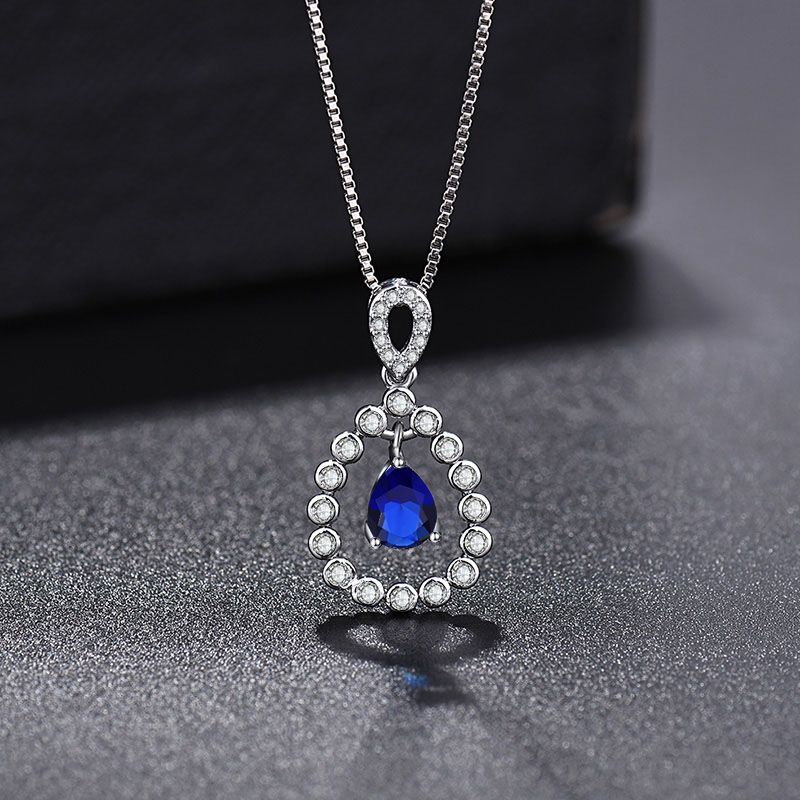 Damen elegante Halskette mit rotigem Anhänger und funkelnden Zirkonia Shop Nory