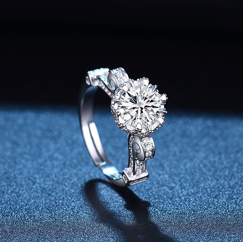 Damen Eleganter Ring mit funkelndem Hauptstein und filigranem Design Shop Nory