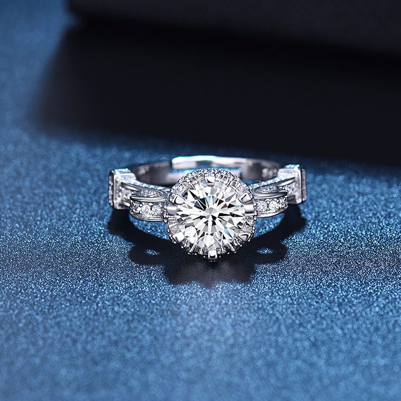 Damen Eleganter Ring mit funkelndem Hauptstein und filigranem Design Shop Nory