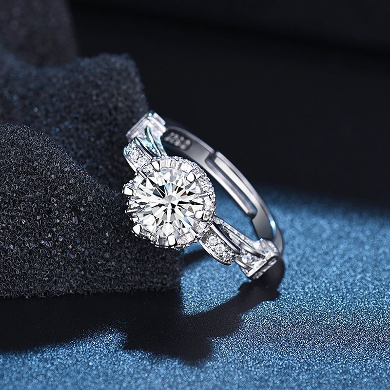 Damen Eleganter Ring mit funkelndem Hauptstein und filigranem Design Shop Nory