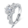 Damen Eleganter Ring mit funkelndem Hauptstein und filigranem Design Shop Nory
