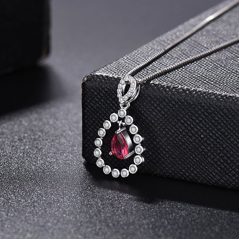 Damen elegante Halskette mit rotigem Anhänger und funkelnden Zirkonia Shop Nory