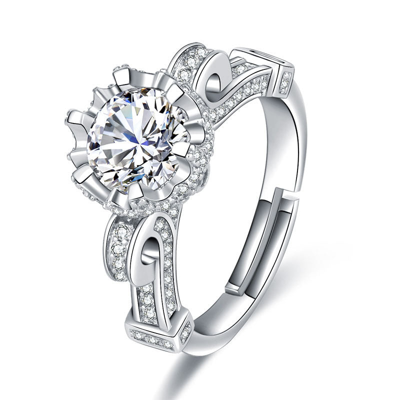 Damen Eleganter Ring mit funkelndem Hauptstein und filigranem Design Shop Nory