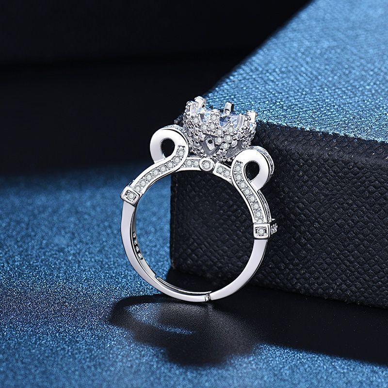 Damen Eleganter Ring mit funkelndem Hauptstein und filigranem Design Shop Nory