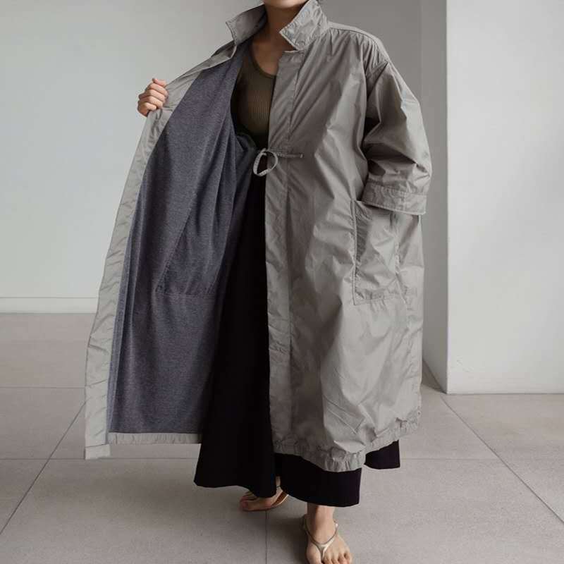 Damen Longline-Parka im leichten Windbreaker-Stil mit innenliegendem Futter, Tunnelzug und Pattentaschen Shop Nory