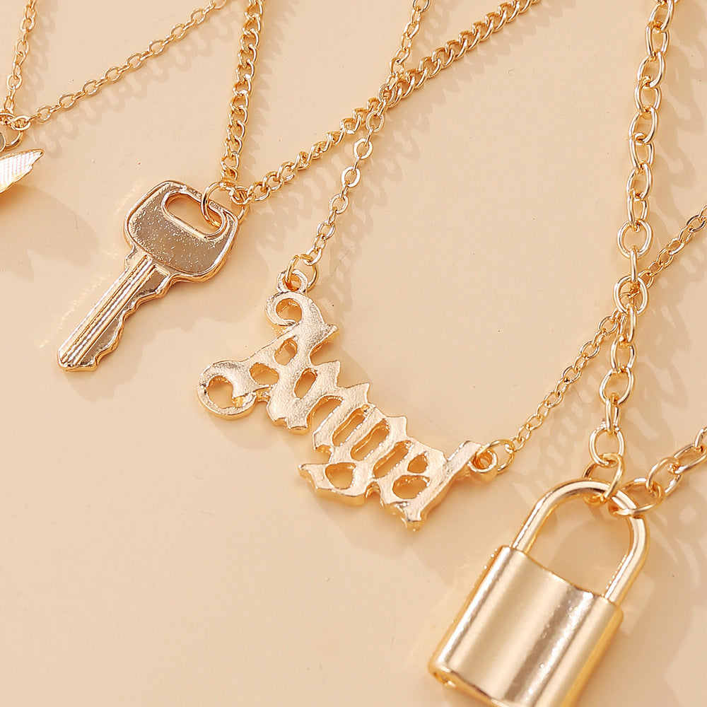 Damen mehrlagige Halskette mit individuellen Anhängern und geometrischen Designs Shop Nory