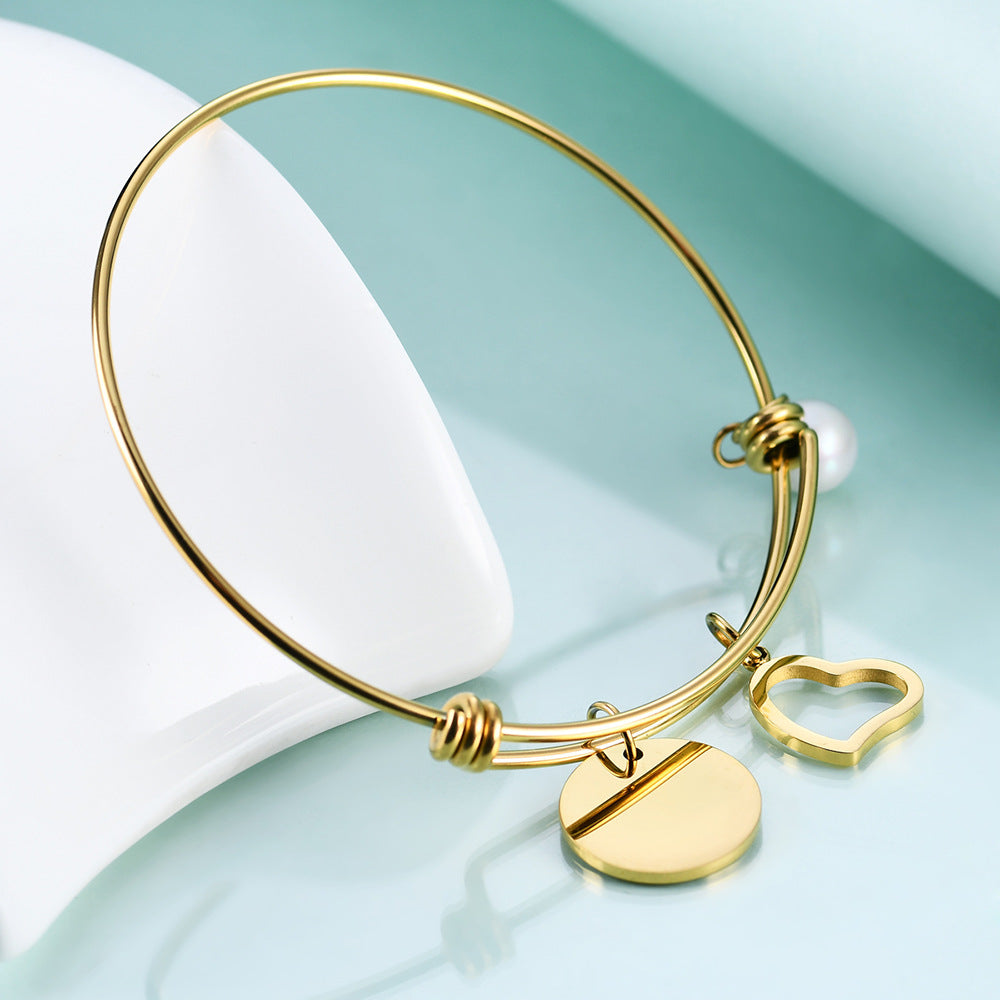 Damen Armreif mit personalisierbarem Anhänger und eleganten Designelementen Shop Nory