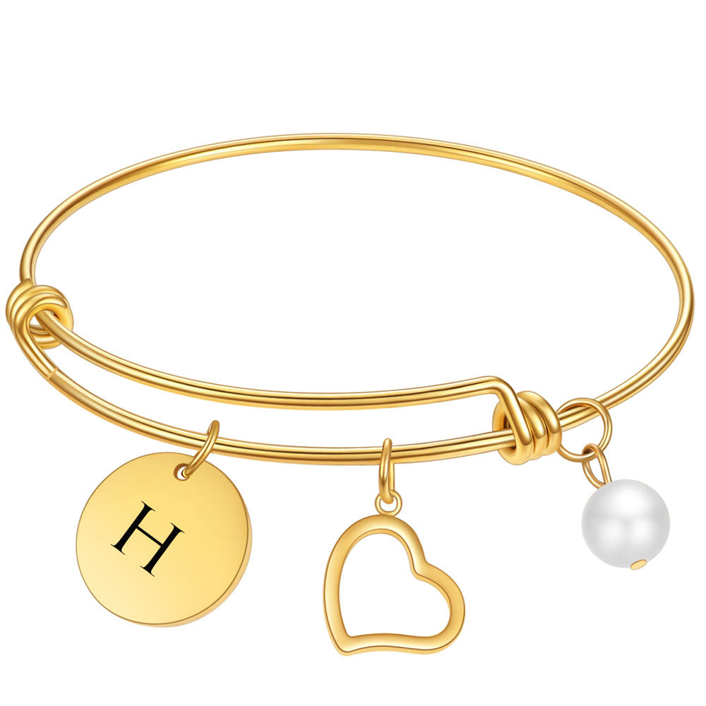 Damen Armreif mit personalisierbarem Anhänger und eleganten Designelementen Shop Nory