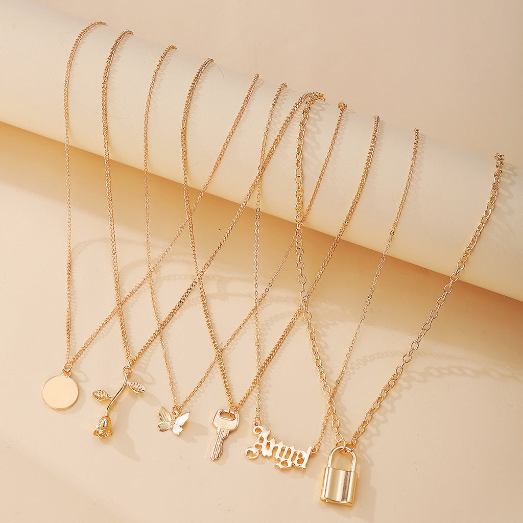 Damen mehrlagige Halskette mit individuellen Anhängern und geometrischen Designs Shop Nory