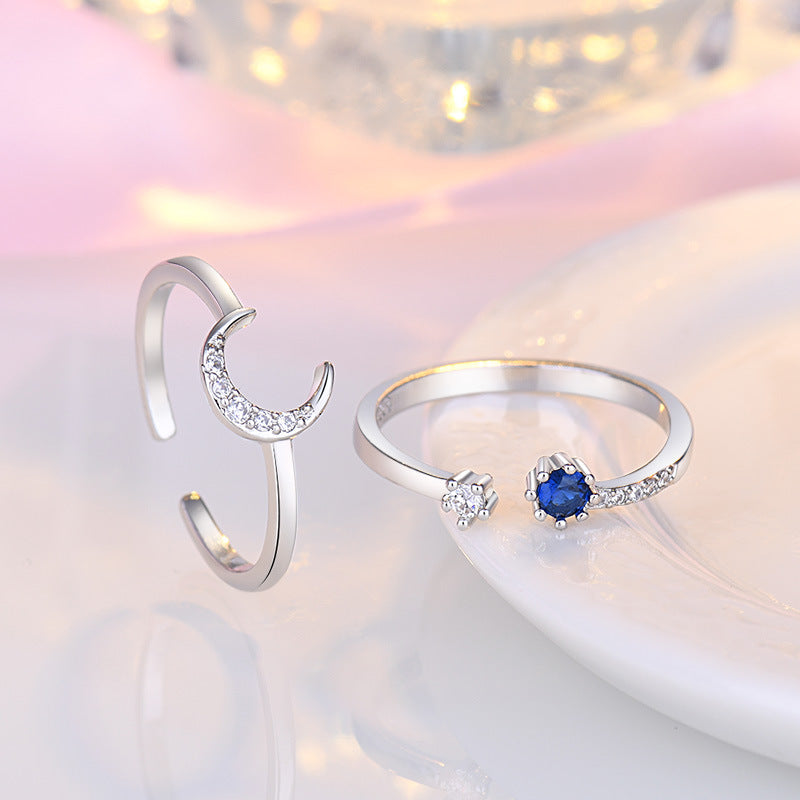 Damen zierlicher Ring mit funkelndem Saphirstein und grazilen Zirkonia-Akzenten Shop Nory
