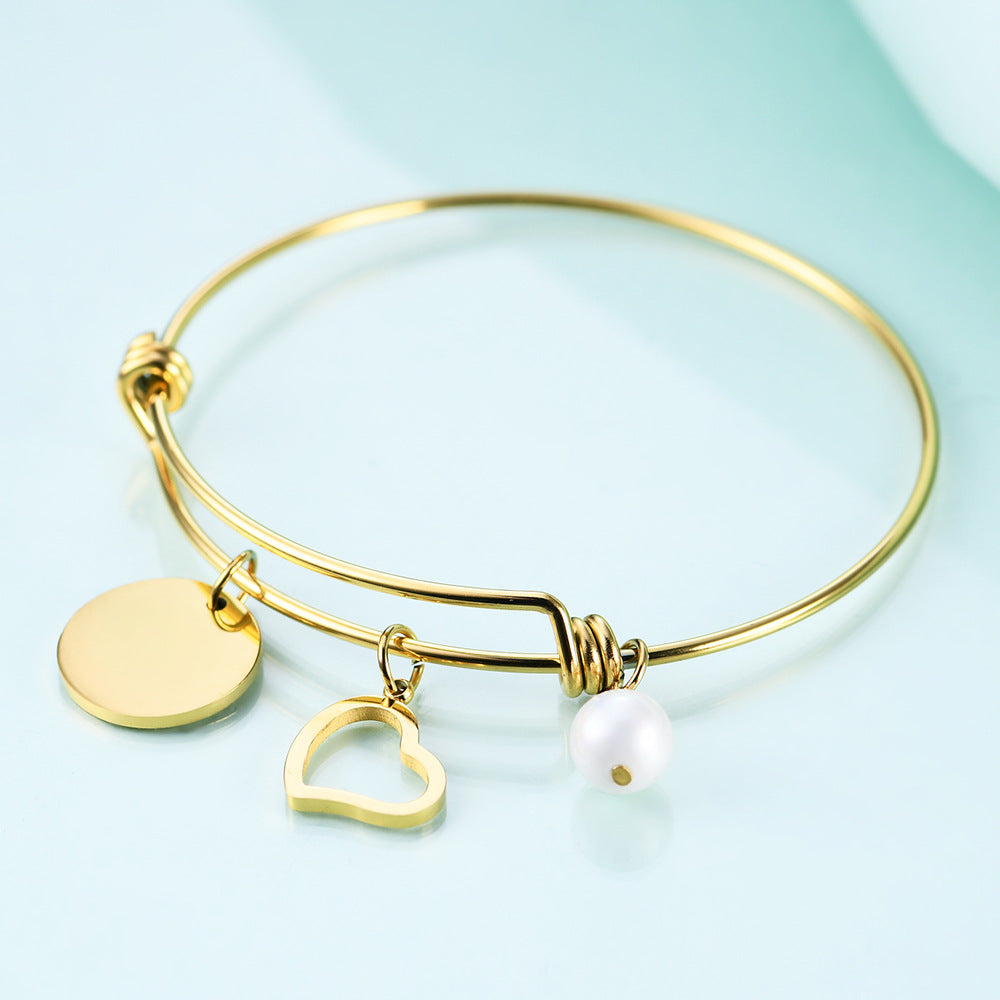Damen Armreif mit personalisierbarem Anhänger und eleganten Designelementen Shop Nory