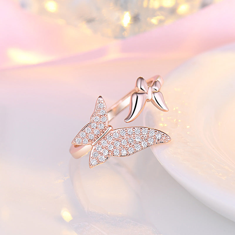 Damen Offener Ring mit filigranem Schmetterlingsdesign und funkelndem Zirkonia Shop Nory