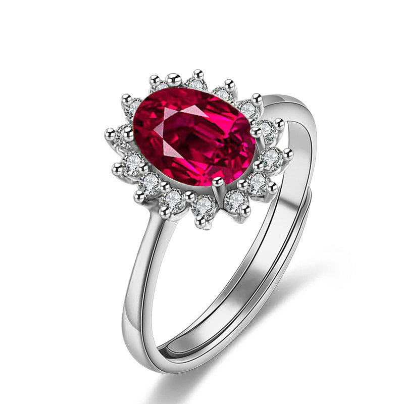 Damenring mit elegantem rotem Hauptstein und funkelndem Zirkonia-Besatz Shop Nory