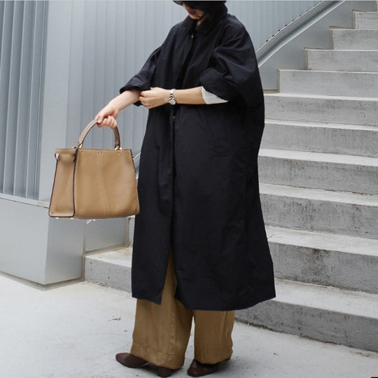 Damen Leichter Maxi-Trenchcoat im minimalistischen Oversize-Cut mit hohem Stehkragen und verdeckter Knopfleiste Shop Nory