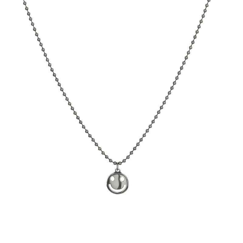 Damen Halskette mit Smiley-Anhänger und eleganter Perlenkette Shop Nory