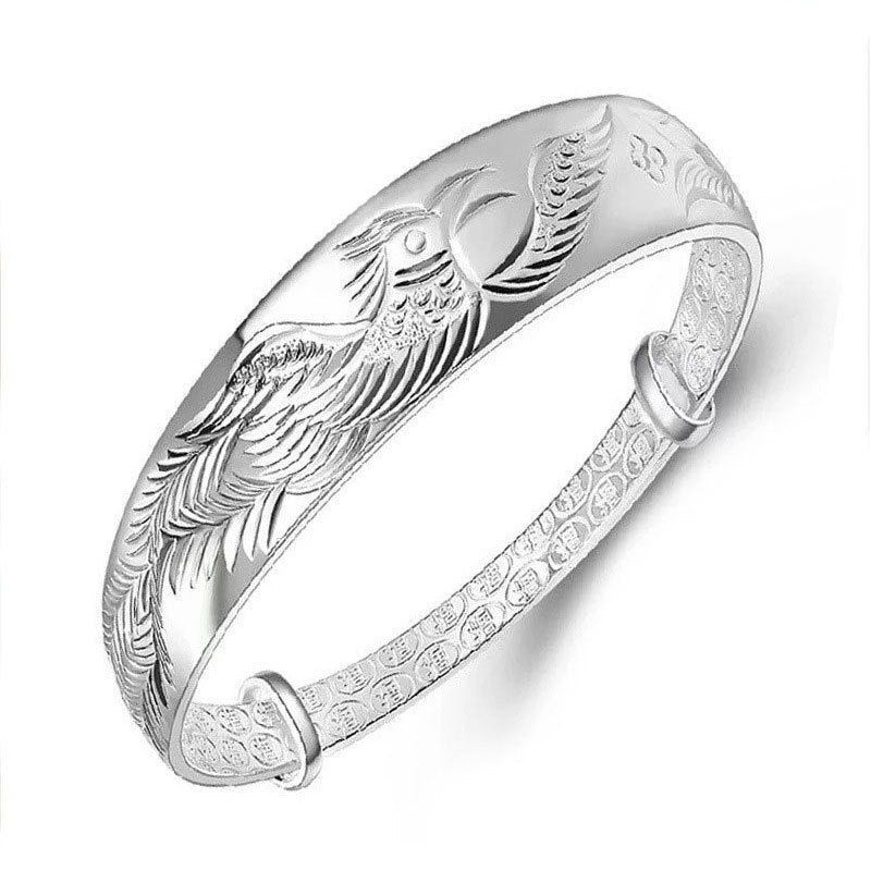 Damen Silberarmband mit kunstvollem Vogelmotiv und feiner Textur Shop Nory