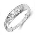 Damen Silberarmband mit kunstvollem Vogelmotiv und feiner Textur Shop Nory