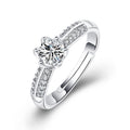 Damen Verlobungsring mit funkelndem Zirkonia-Besatz und eleganter Blumenkopfform Shop Nory