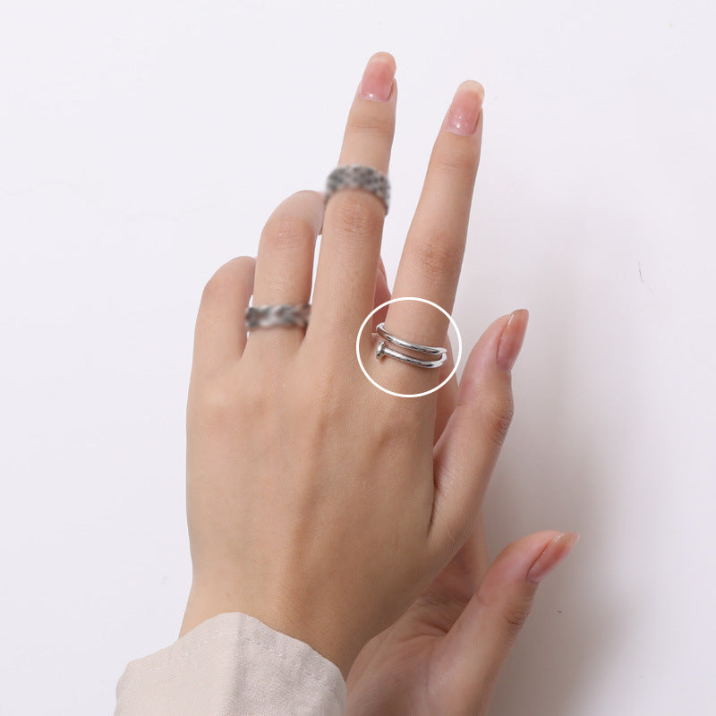 Damenring mit elegantem, gewelltem Design und funkelndem Zirkonia-Besatz Shop Nory