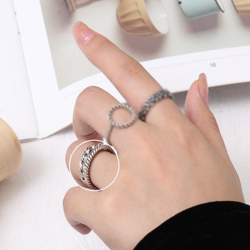 Damenring mit filigranem Blumenmuster und einem eleganten Design Shop Nory