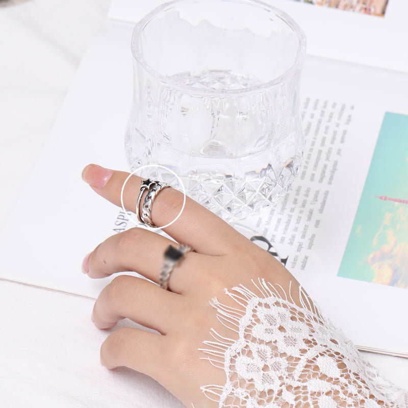 Damenring mit elegantem, gewelltem Design und funkelndem Zirkonia-Besatz Shop Nory