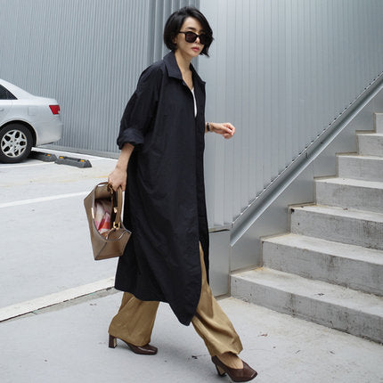 Damen Langer Oversize-Dustercoat mit Rückenschlitz, überschnittener Schulter und praktischen Eingrifftaschen Shop Nory