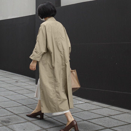 Damen Langer Oversize-Dustercoat mit Rückenschlitz, überschnittener Schulter und praktischen Eingrifftaschen Shop Nory