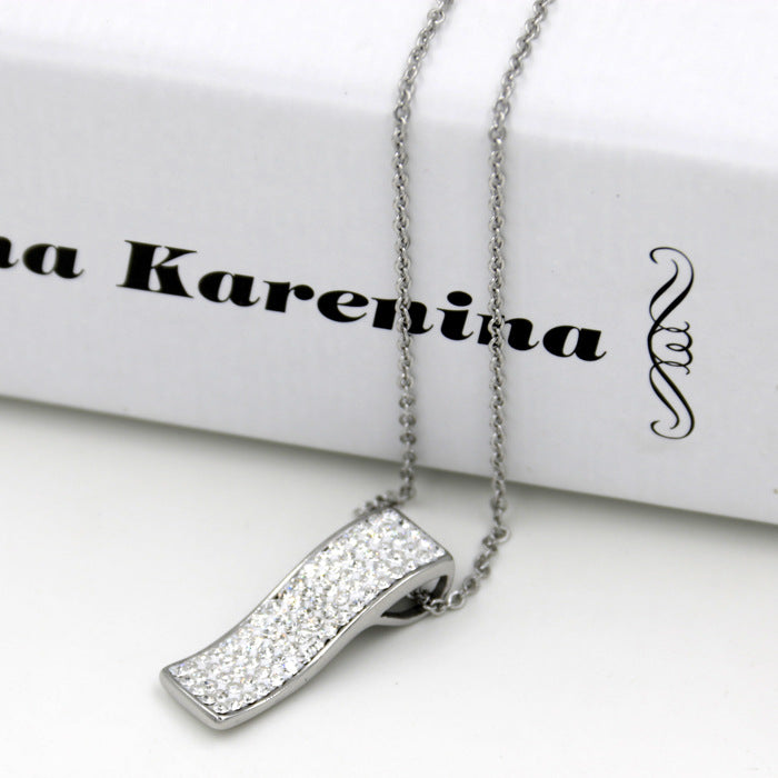 Damen Halskette mit elegantem Wellenanhänger und funkelndem Zirkonia-Besatz Shop Nory