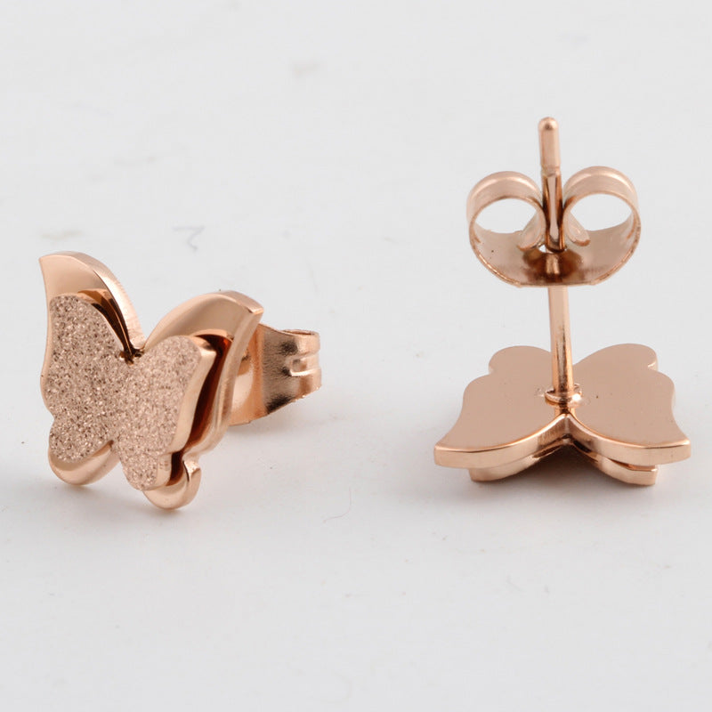 Damen Ohrstecker im Schmetterlingsdesign mit funkelndem Akzent Shop Nory
