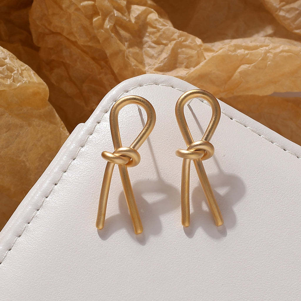 Ohrringe "Esme" im Knoten Design - 18k vergoldet | Shop Nory