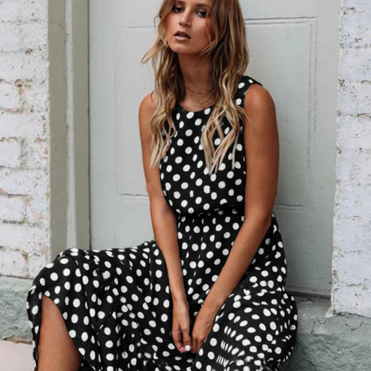 Schwarzes Polka Dot Midikleid für Einen Retro Chic Look