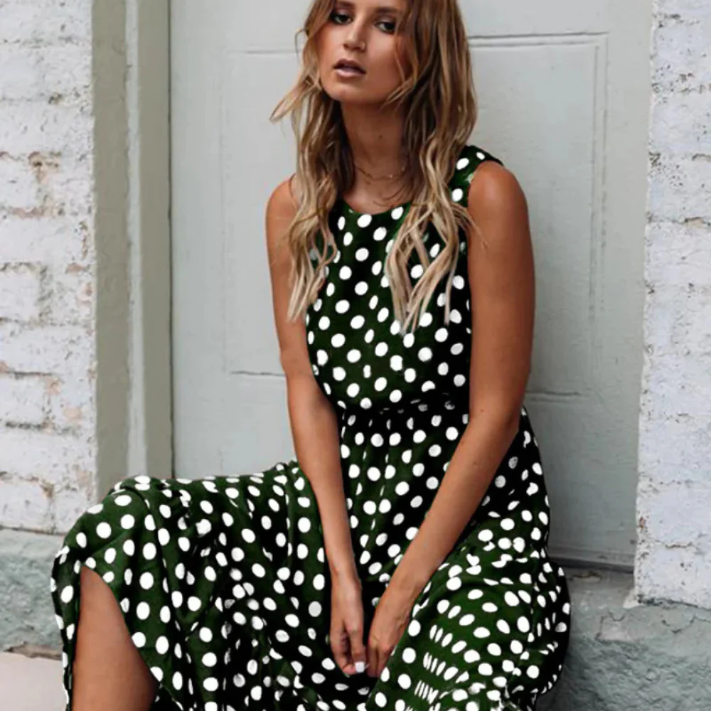 Schwarzes Polka Dot Midikleid für Einen Retro Chic Look