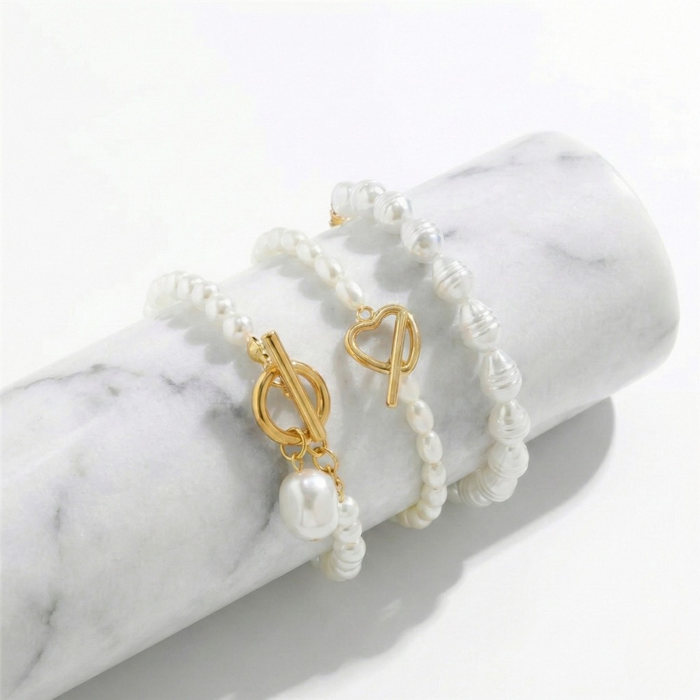 Damen Perlenarmband mit Knebelverschluss und Anhänger | Shop Nory